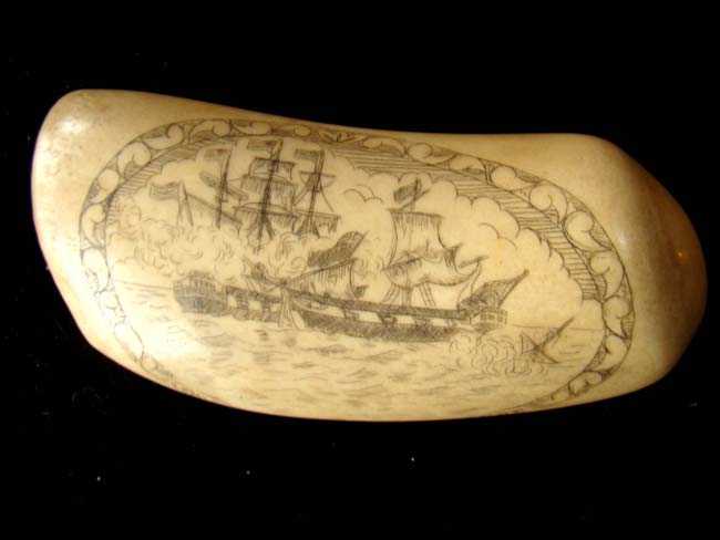 An attractive late 19th or early 20th century scrimshawed whale's tooth with US Navy theme — image 3